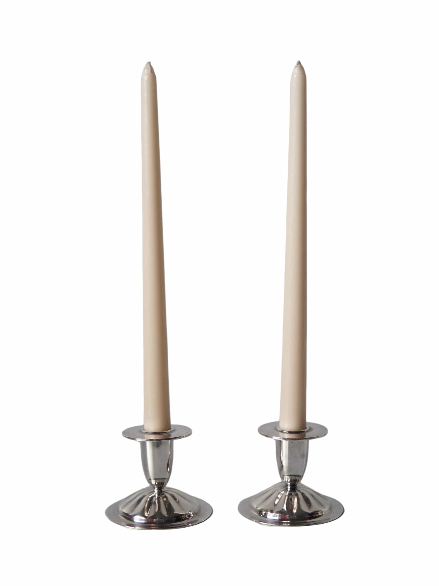 Case Study Objects Set of two silver candlestick holders La Bomba Floristry Vancouver Canada Set of two silver candlestick holders