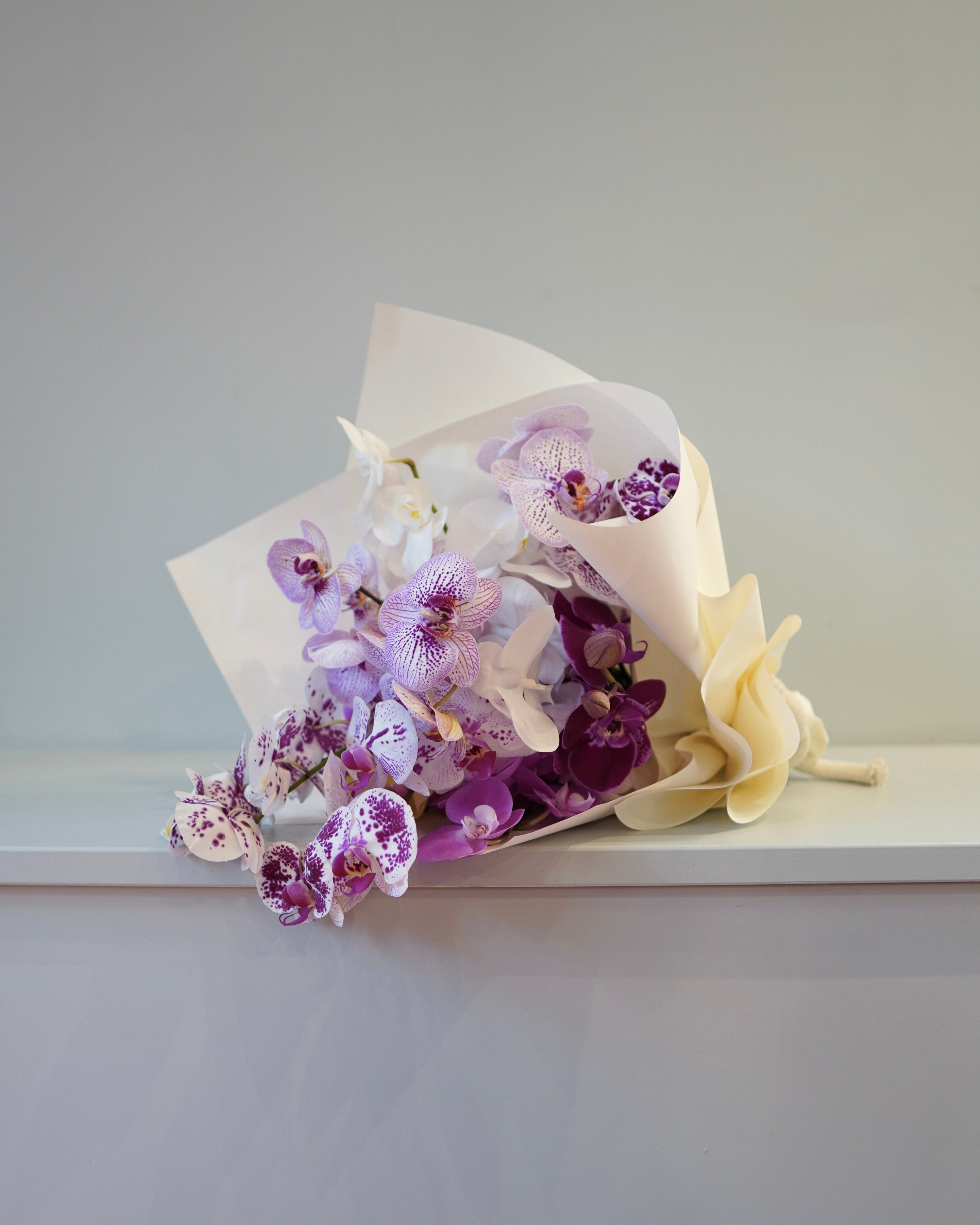 La Bomba Floristry Arrangements Signature Wrap / 9 Stems SINGLE SPECIES — Orchids La Bomba Floristry Vancouver Canada SINGLE SPECIES — Orchids